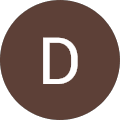 A brown circle with the letter d in it.